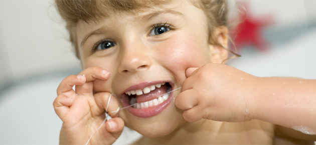 Child Flossing